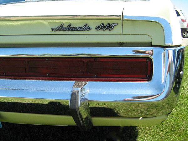 Rear bumper with integrated tail lamps and a rubber-faced guard on a 1970 AMC Ambassador