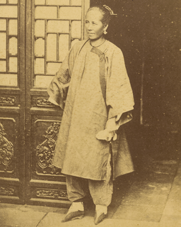A Nanny or Servant from a Rich Household, in a Cotton Gown over Trousers, with Traditional Lotus (Bound) Feet. China, 1874 WDL1918 (cropped)