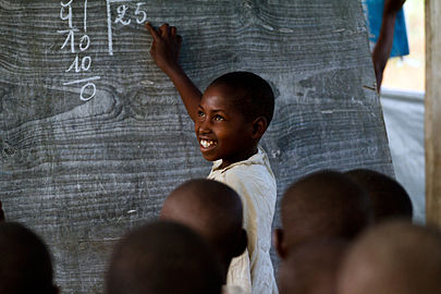 A young Congolese boy during a lesson at the Mugosi Primary School, which caters mostly for children of the Kahe refugee camp in the town of Kitschoro, in the north eastern part of the Democratic Republic of the Congo.