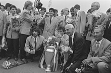 Eric Gerets (left) posing with the European Cup, together with Frits Philips (right)