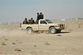 Afghan forces driving in the desert