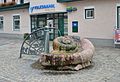 Ammonite fountain in Golling an der Salzach.jpg