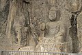 Ancient Buddhist Grottoes at Longmen- Three Buddhas on the Cliff, Buddha on the Southern Side.jpg