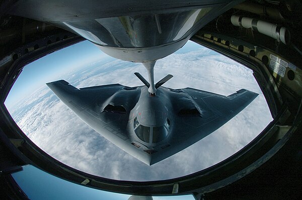 A B-2 Spirit bomber from the 509th Bomb Wing, Whiteman AFB, Missouri refuels from a KC-135 Stratotanker