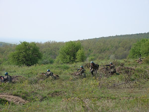 A Romanian squad of a TAB-77 APC in 2010. This is a typical Soviet arrangement, with a PK general purpose machine gun and a RPK light machine gun in t