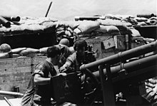 Battery A, 1/12 Marines prepare to fire their M101 at Firebase Fuller, January 1969 Battery A, 1.12 Marines prepare to fire their 105mm gun at Firebase Fuller, Dong Ha Mountain.jpg