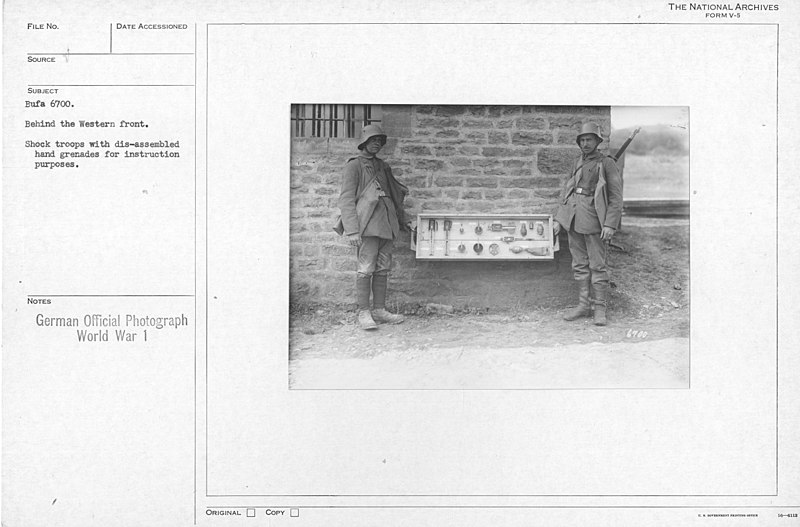 File:Behind the western front. Shock troops with dis-assembled hand grenades for instruction purposes - NARA - 17391296.jpg