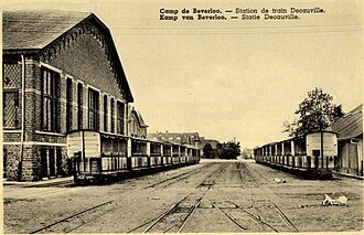 Kamp van Beverloo - Station of the Decauville field railway.  The cars are probably from the British War Department.  Roof and seats were retrofitted.  1920s. [1]