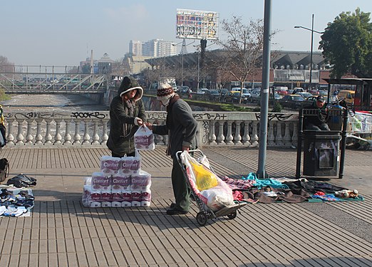 Street vendor selling toilet paper