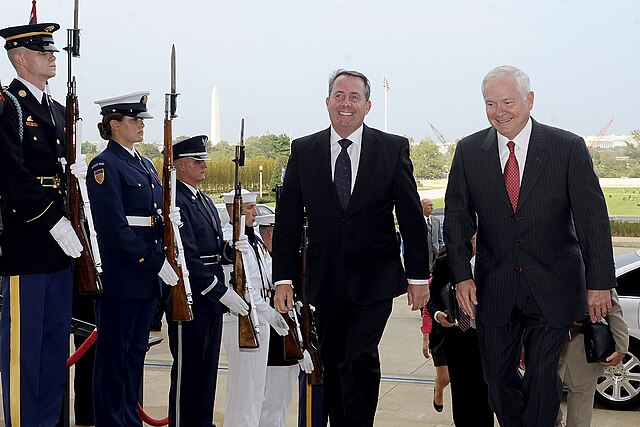 Secretary of Defense Robert M. Gates escorts Fox through an honor cordon and into The Pentagon in 2010