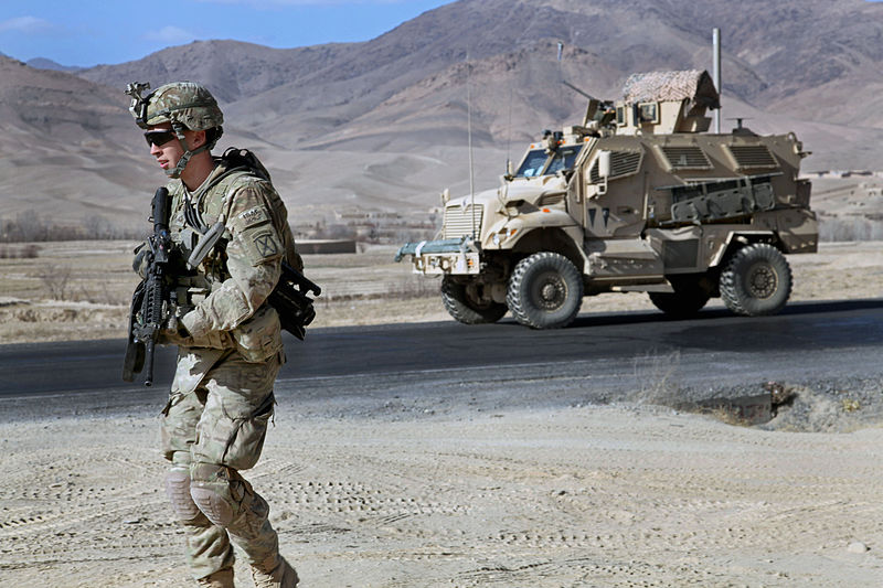 File:Defense.gov News Photo 101221-A-6521C-049 - U.S. Army Pfc. Samuel Ford walks next to his vehicle in order to clear and document culverts along a highway in the Wardak province Afghanistan.jpg