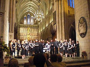 Desmond Tutu joins the Southwark Cathedral Merbecke Choir on stage DesmondTutuonstagewithMerbecke.jpg