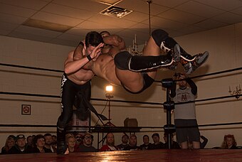 Dezmond Xavier executing a stunner on "Speedball" Mike Bailey at an Indy show event in 2016 Dezmond Xavier stunner.jpg