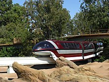 Monorail Red travels over the Finding Nemo Submarine Voyage in Tomorrowland. Disneyland Mark VII Monorail Red.jpg