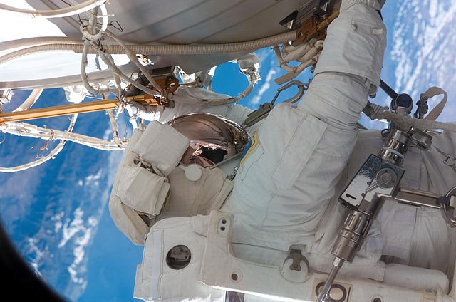 Wheelock working on the outside of the International Space Station during STS-120