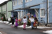 Childrens go to collect candy from the neighborhood Easter witches in Nissila IM5293 C.jpg