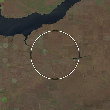 Circle shows the approximate rim of Elbow crater. There is no surface expression of the structure. Elbow crater LC08 L1TP 037024 20181006 20181010 01 T1.jpg