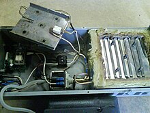 Interior view of a fog machine, showing the pump and heat exchanger. Fogger Insides.JPG