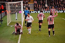 Healy (in white) playing against Sunderland in April 2008 Fulham vs Sunderland.jpg