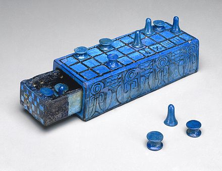 Ancient Egyptian gaming board inscribed for Amenhotep III with separate sliding drawer, from 1390 to 1353 BC, made of glazed faience, dimensions: 5.5 × 7.7 × 21 cm, in the Brooklyn Museum (New York City)
