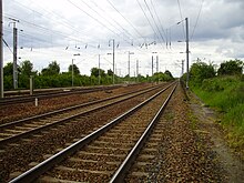 Kryss mellom venstre, Ormoy-Villers - Boves-linjen og til høyre La Plaine - Hirson-linjen.