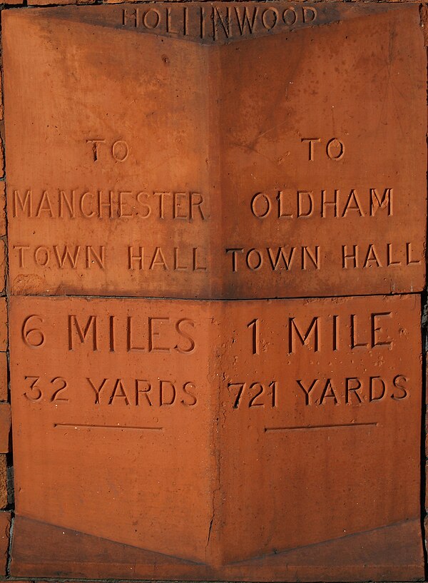 This milestone, part of the Smut Inn public house, indicates the distance between Oldham and Manchester Town Hall.