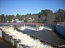 A labyrinth spillway and a fish ladder (left) of the Hope Mills Dam in North Carolina