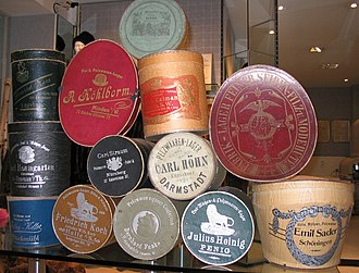 A collection of vintage branded hat boxes of varying sizes Hutkartons von Kuerschnern.JPG