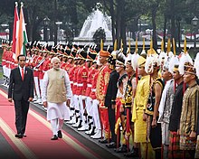 Indian Prime Minister Narendra Modi inspects guard of honor wearing traditional clothing of Indonesia at Merdeka Palace, Jakarta Indian Prime Minister Narendra Modi receives a guard of honor during a state visit to Indonesia, 2018.jpg