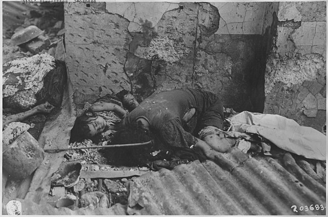Photo of a Filipino woman and child killed by Japanese forces in Manila.