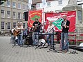 Local island band "Lucid", performing at the Isle of Wight Stop the Cuts rally held in St Thomas Square, Newport, Isle of Wight in May 2011, designed to raise awareness about cuts occuring on the island to public services and the NHS made by the Isle of Wight Council.