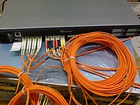 SAN-switch Qlogic with optical Fibre Channel connectors installed ML-QLOGICNFCCONN.JPG