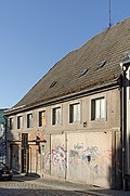 Residential house in half-open development and corner location