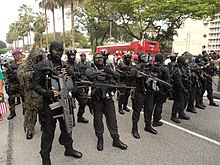 Navy PASKAL operators on standby during 57th National Day Parade Of Malaysia. Sailor at left holds an XM8. Navy PASKAL opearators on standby during 57th NDP.JPG