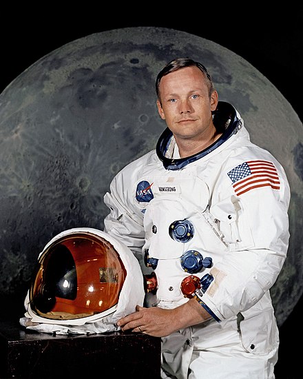 Armstrong posing in his spacesuit