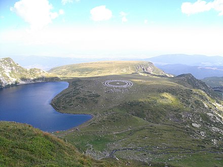 Members of the Universal White Brotherhood, a Hermetic/Theosophical religious organisation founded in Bulgaria itself, practising paneurhythmy at the Seven Rila Lakes.