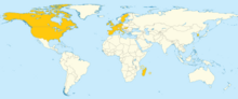 Carte du monde indiquant certains pays en orange.