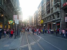 Pedestrians take over roadway and tramway (19061081075).jpg