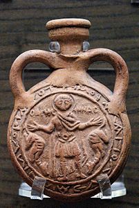 Terracotta pilgrim's Menas flask impressed with Saint Minas between two camels, Byzantine, 6th–7th century, probably made at Abu Mina, Egypt (Louvre Museum)
