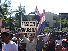 Crowds outside the National Assembly, with signs calling for the resignation of Prime Minister Said Musa. Protest 0082.JPG