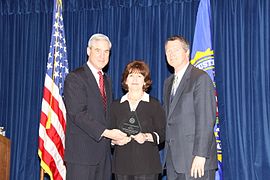 FBI Director Robert Mueller community outreach program founder Mickey Gottfried, American sportscaster, football player and coach Mike Gottfried