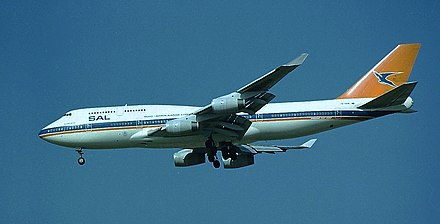 A Boeing 747-400 "ZS-SAW" painted in the pre–1997 orange, blue and white livery just after 1992, featuring the Afrikaans name of the airline SAL (Suid-Afrikaanse Lugdiens).