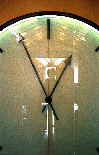 File:Self-reflection in clock in Cafe Costes in Paris, 1987.jpg