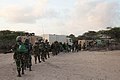 Soldiers belonging to the Burundian contingent of the African Union Mission in Somalia prepare to march on the Al Shabab held town of Ragaele in the Hiraan region of Somalia on September 30. AMISOM (15413860921).jpg