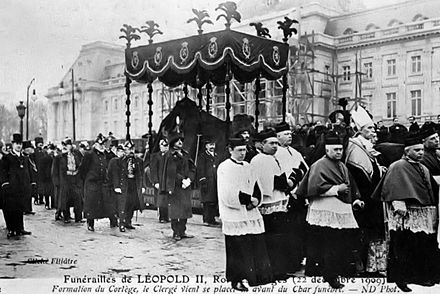 Leopold II's funeral procession passes the unfinished Royal Palace of Brussels, 22 December 1909
