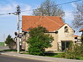 Čeština: Obecní úřad spojený s hasičskou zbrojnicí ve Spomyšli. English: Council joint with fire station in Spomyšl.