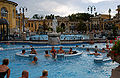 Budapest thermal spa Széchenyi Gyógyfürdő. Outside pool with jacuzzi and contraflow.