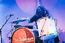 Former drummer Josh Morgan performing with the band The Subways at Club 85 (49646411312).jpg