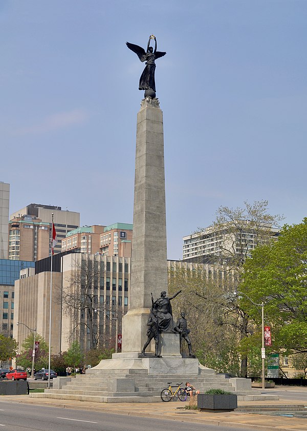 The soaring South African War Memorial by Walter Seymour Allward stands in the median just north of Queen Street West