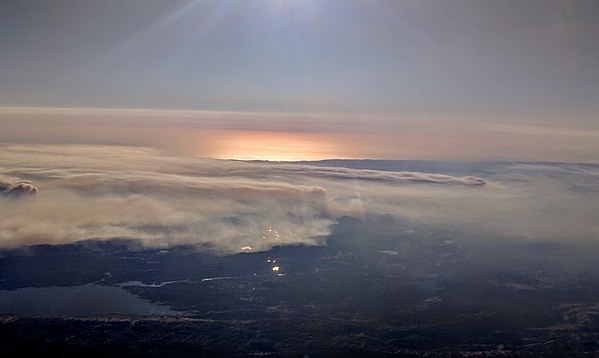 Aerial view of smoke from the Tubbs and Pocket fires, with the north end of Lake Berryessa, October 12